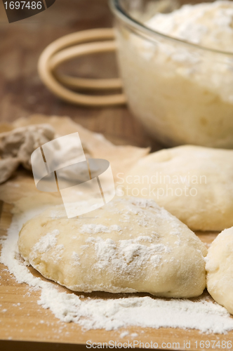 Image of Dough on wooden board