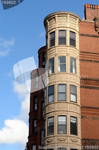 Image of ornate rounded bay windows two