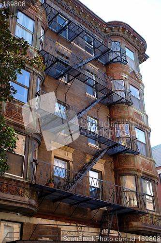 Image of ornate rounded bay windows three