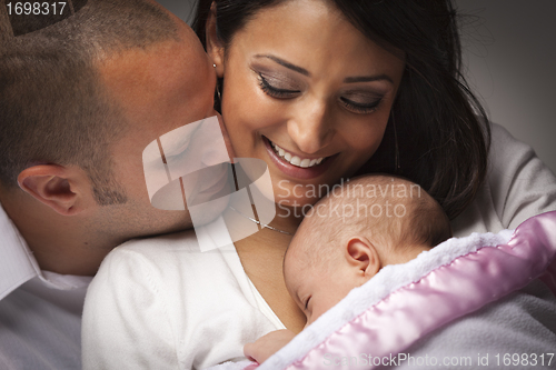 Image of Mixed Race Young Family with Newborn Baby