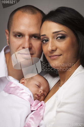 Image of Mixed Race Young Family with Newborn Baby