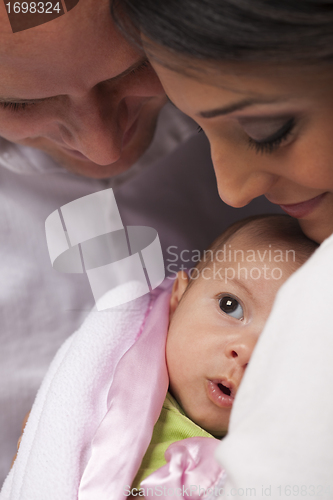 Image of Mixed Race Young Family with Newborn Baby