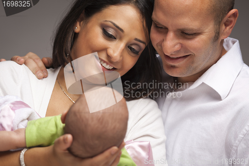 Image of Mixed Race Young Family with Newborn Baby