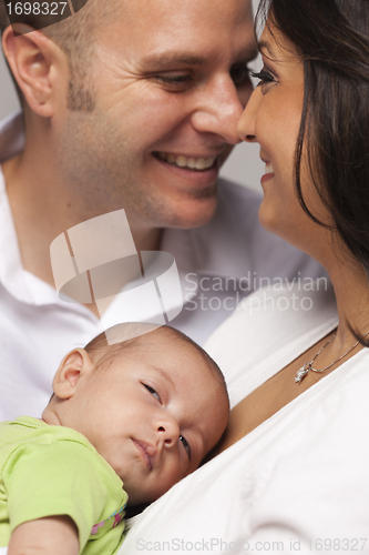 Image of Mixed Race Young Family with Newborn Baby