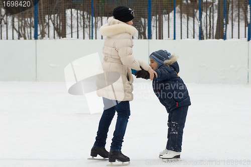 Image of Helping to skates. First try