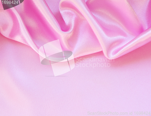 Image of Smooth elegant pink silk as background 