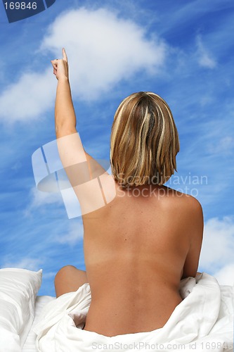 Image of Bed Woman Pointing