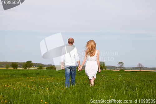 Image of young happy couple have fun in summer