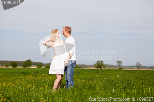 Image of young happy couple have fun in summer