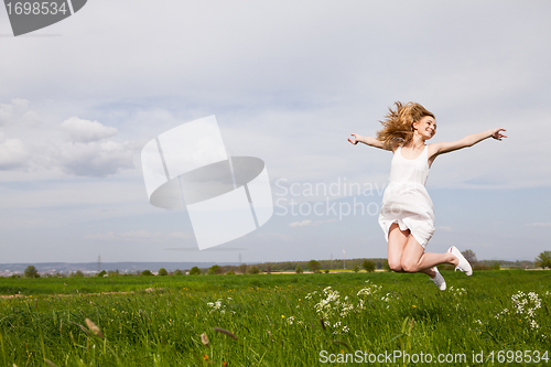 Image of beautiful blonde woman outdoor in summer happy