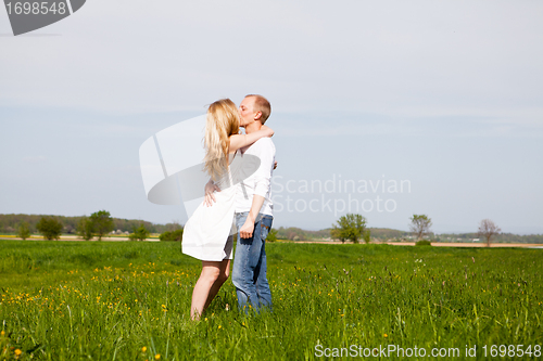 Image of young happy couple have fun in summer