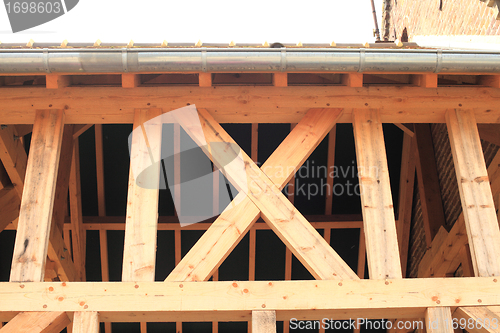 Image of wood frame of a house under construction