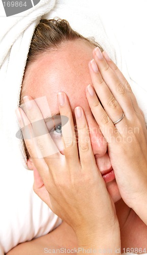 Image of Shy Woman in Towel