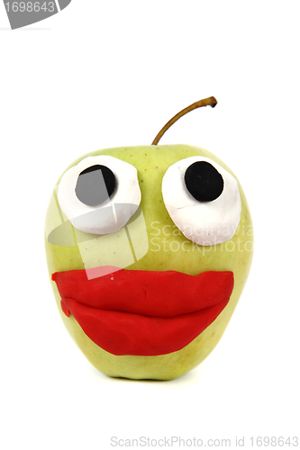 Image of green apple with plasticine smile