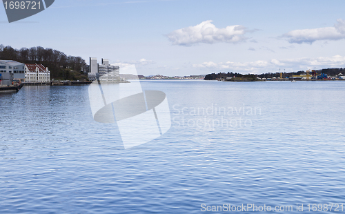 Image of coastline with town and harbor in norway