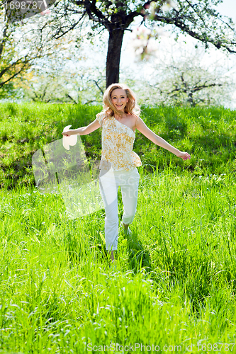Image of beautiful young girl happy in summer outdoor