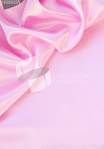 Image of Smooth elegant pink silk as background 