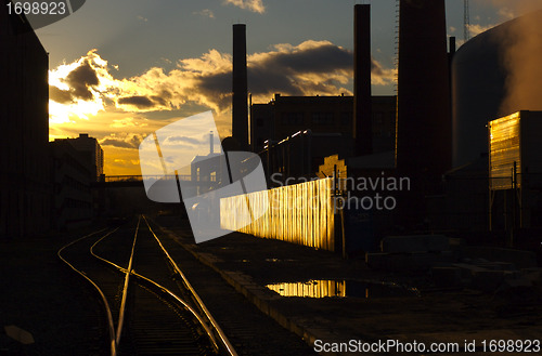 Image of Railroad tracks at sunset