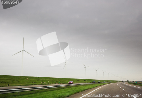 Image of Wind turbines on highway