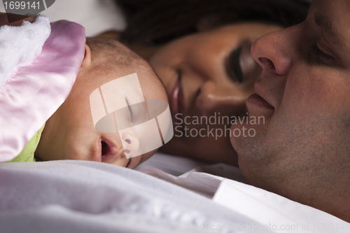 Image of Mixed Race Young Family with Newborn Baby