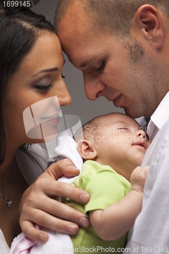 Image of Mixed Race Young Family with Newborn Baby