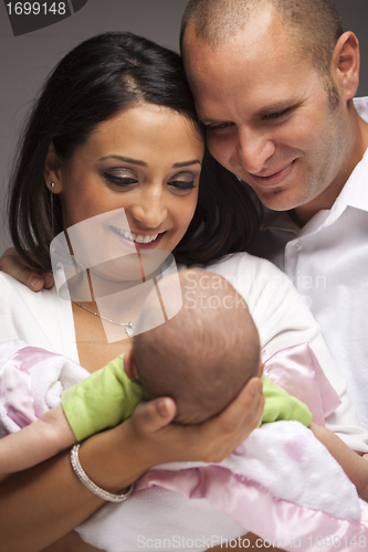 Image of Mixed Race Young Family with Newborn Baby