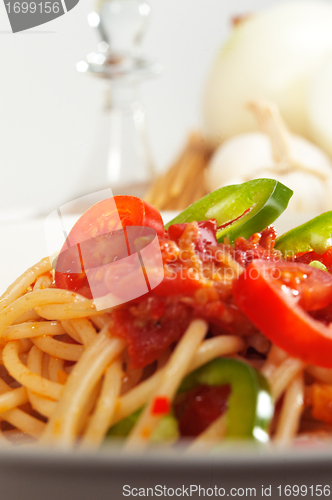 Image of spicy italian pasta tomato and chili peppers sauce