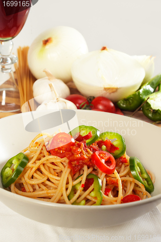 Image of spicy italian pasta tomato and chili peppers sauce
