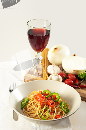 Image of spicy italian pasta tomato and chili peppers sauce