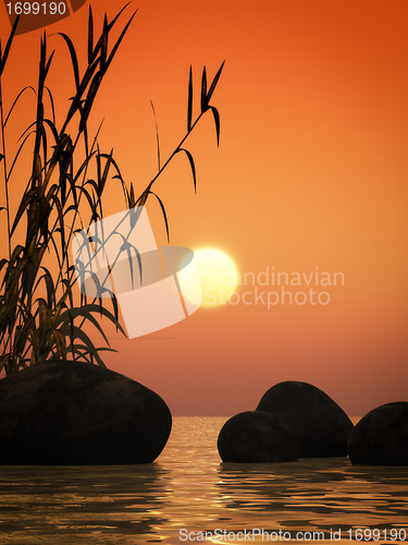 Image of ocean sunset bamboo and stones