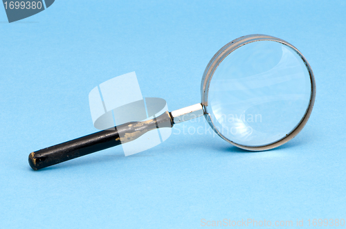 Image of magnifying glass zoom retro tool blue background 