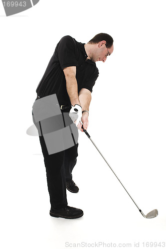 Image of man playing golf