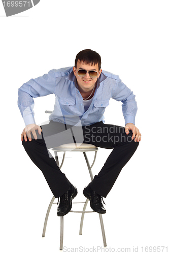 Image of Guy sitting on the chair
