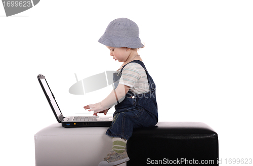 Image of Little boy with a laptop