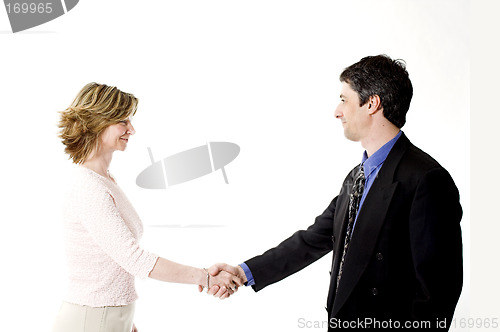 Image of business people shaking hands