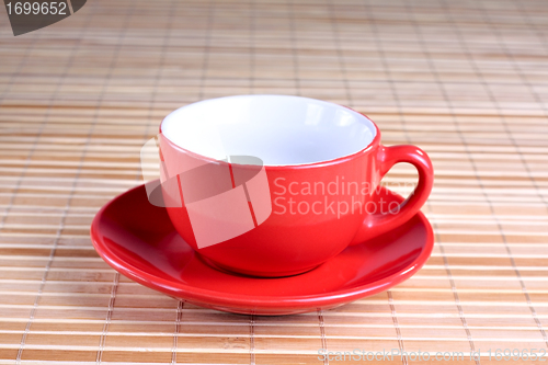 Image of Empty red cup at the plate