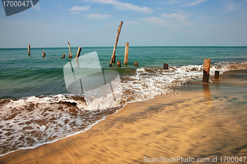 Image of old jetty pillars in sea