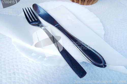 Image of Cutlery over white plate