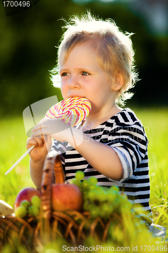 Image of little boy with a sweet