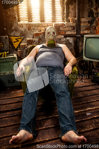 Image of man in a gas mask