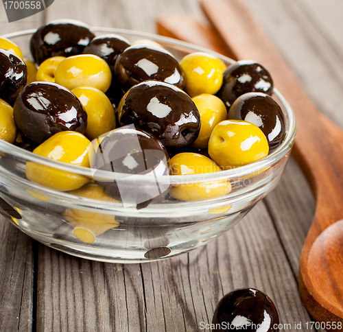 Image of Olives on a wooden table