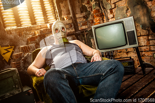 Image of man in a gas mask