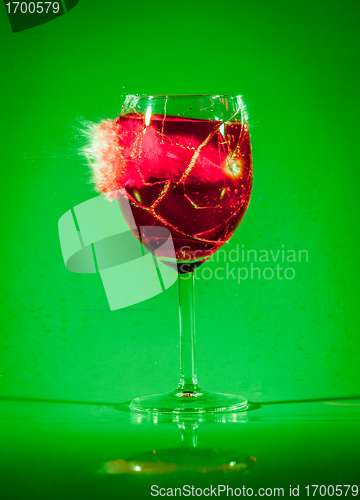 Image of Glass with drink by bullet