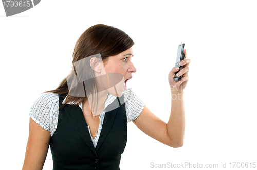 Image of Angry businesswoman shouting to mobile