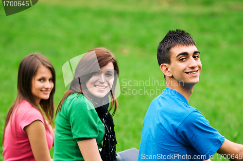 Image of Young students learning outdoor