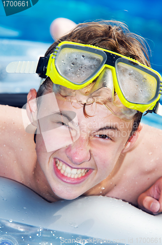 Image of Playful boy in a pool