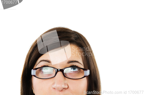 Image of Thoughtful businesswoman looking up