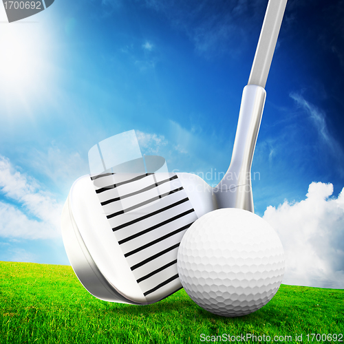 Image of Playing golf. Ball on tee, a golf club