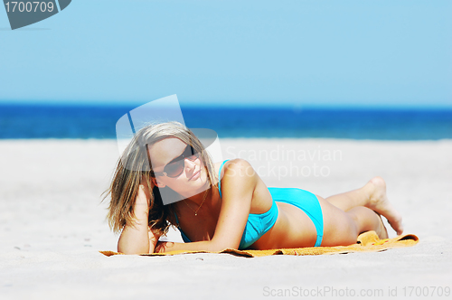 Image of Beautiful woman on the beach