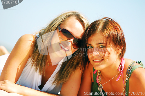 Image of Young girls on the summer beach